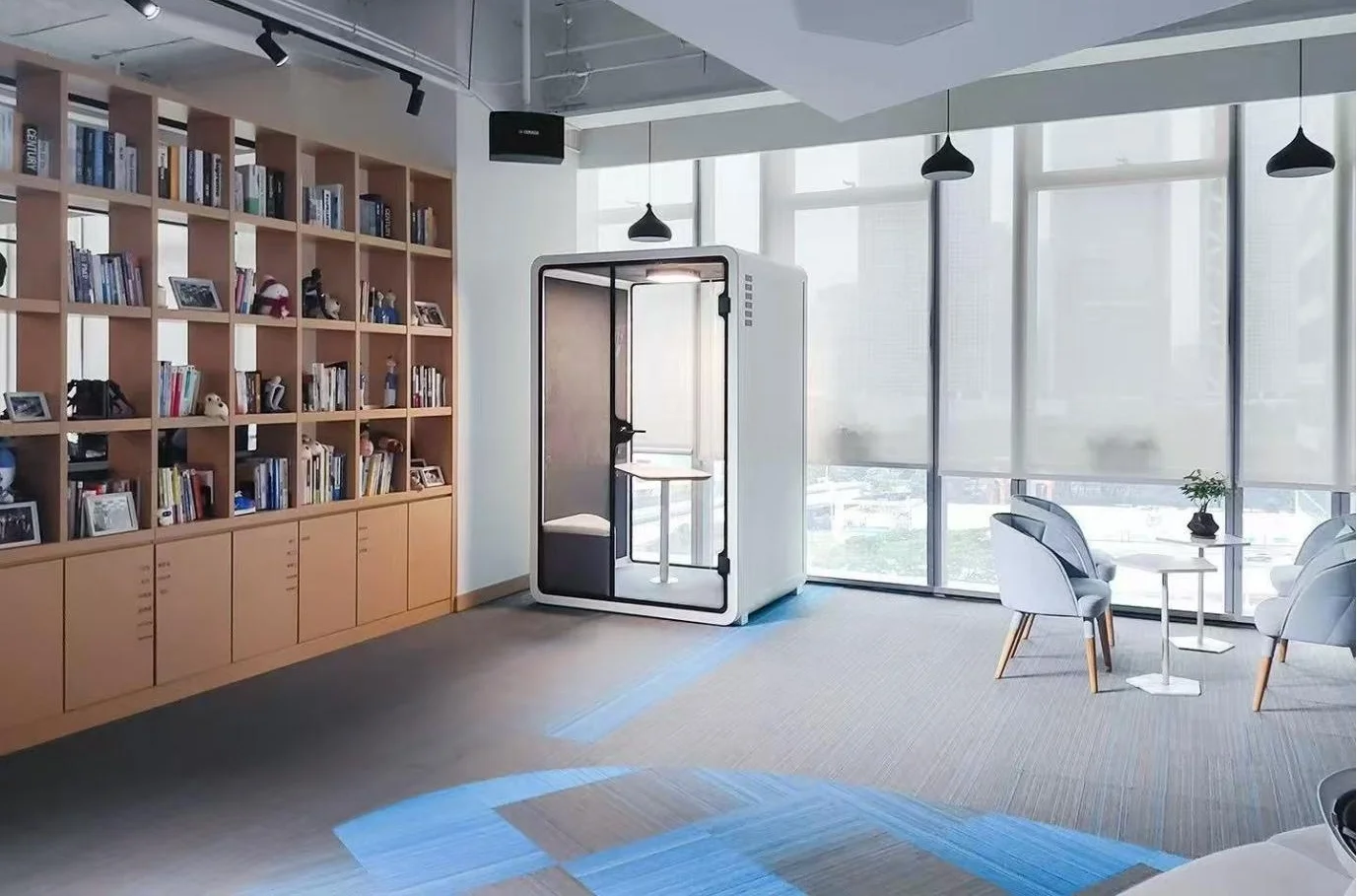 Acoustic pod in a corner office setting